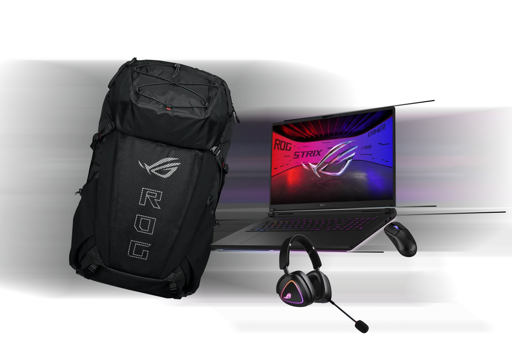 ROG gaming peripherals including backpack, headset, and laptop for a complete battlestation setup.
